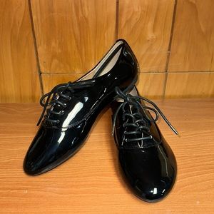 Shiny lace up flats